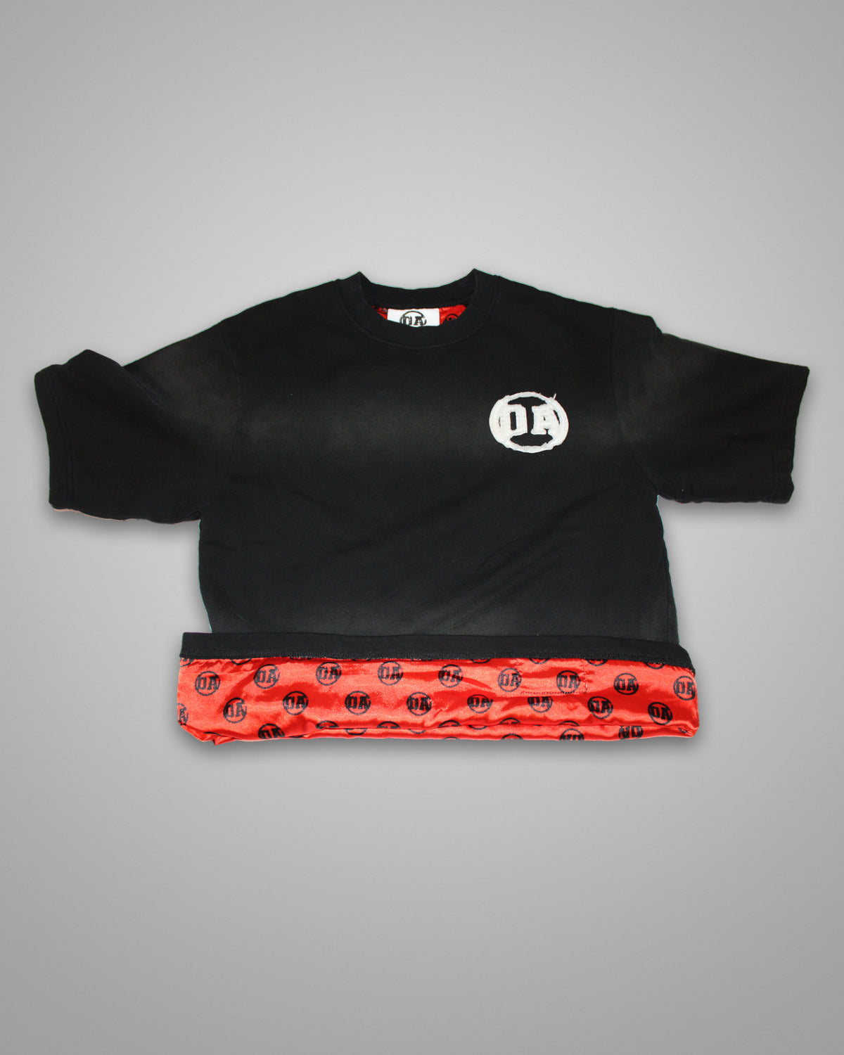 Origin Blank tee in black with the OA chest patch and the red OA silk lining at the hem